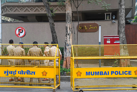 Mumbai: Police personnel stand guard near barricades outside the Juhu residence of film director Rohit Shetty following a firing incident in which unidentified assailants fired multiple rounds outside the house late on Saturday night, in Mumbai on Sunday, February 1, 2026. (Photo: IANS)