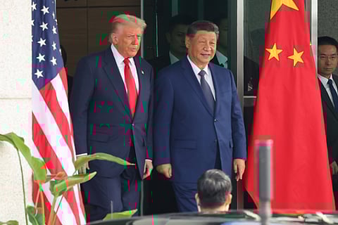 Ahead of China visit, Trump stresses ties and rivalry