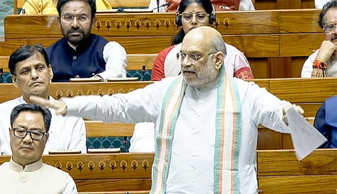 New Delhi: Union Home Minister Amit Shah speaks in the Lok Sabha during the second part of the Budget Session of Parliament in New Delhi on Monday, March 30, 2026. (Photo: IANS/Sansad TV)