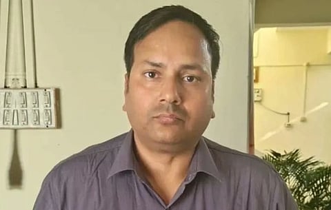 Image of Former Army Captain Sandeep Tomar, Who Murdered His Wife. in the image is he wearing a grey shirt.