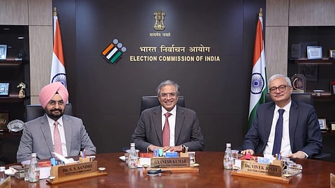 In the image Chief election officer is shown with two other officer in Election commission of India office