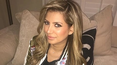 In the image Ketamine Queen is shown posing to the camera