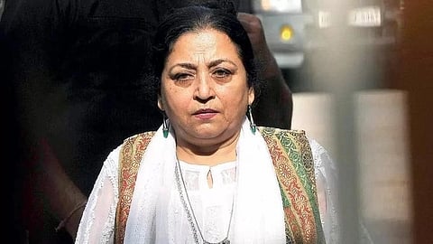 In the image Madhu Kishwar us shown