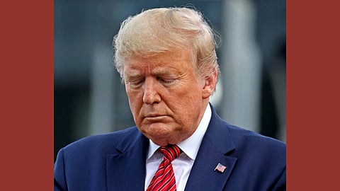 In the image Donald Trump is shown with his eyes closed