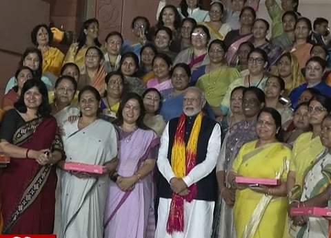 PM Modi with Women MPs after the Women's Reservation Bill was passed in 2023 in the Lok Sabha