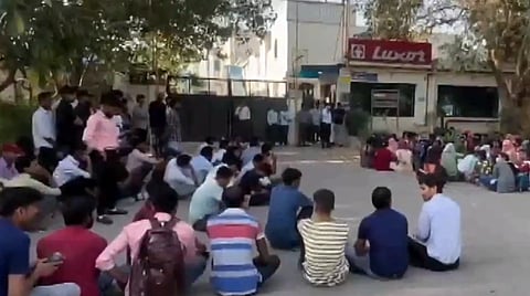 Workers protesting in Noida demanding higher wages as UP government announces interim hike