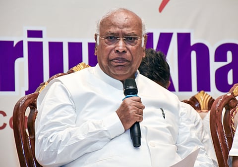 Mallikarjun Kharge with a mic