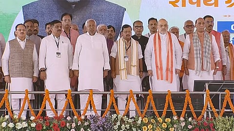 Major BJP leaders are shown in stage including Rajnath Singh Amit Shah Nitin Nabin Nitish Kumar and others