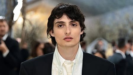 In the image Finn Wolfhard is shown in a event