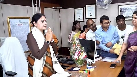 Agnimitra Paul with folded hands in office