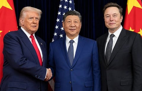 Image of Trump shaking Xi Jinping and Elon Musk standing in front of a black background with national flags of USA and China.