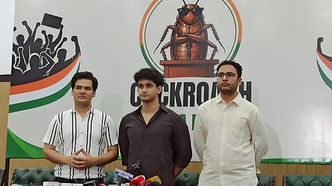 CJP Chief Spokesperson Saurav Das with two other spokesperson standing in front of CJP banner addressing media.
