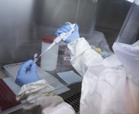 In the image a doctor is shown wearing PPE Kit