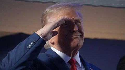In the image Donald Trump is shown saluting