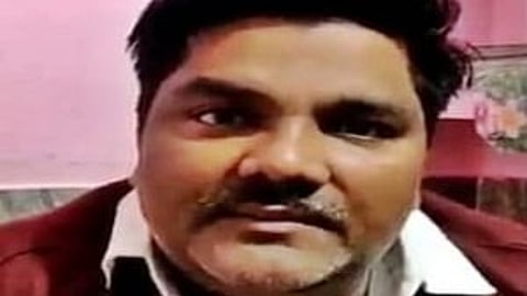 In the image close up of Tahir Hussain is shown