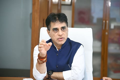 In the image Gujarat Heath Minister Praful Pansheriya is shown