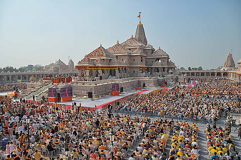 A bustling crowd surrounds the Shri Ram Janmabhoomi Mandir, reflecting the cultural and religious importance of the location.