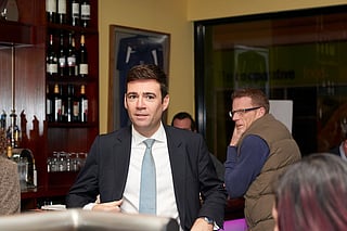 In the image Andy Burnham in a public gathering in his youth