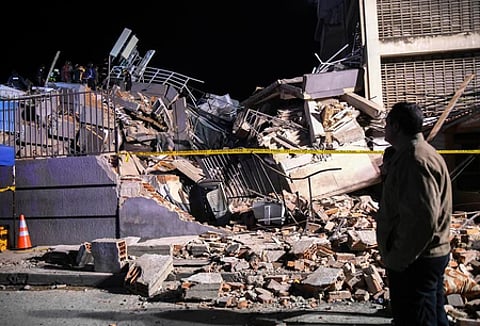 In the image a demolished building is shown from venezuella