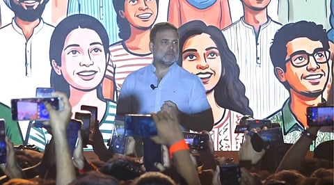 Rahul Gandhi standing amidst the public