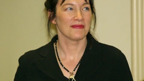 The image shows Alice Sebold, an American author best known for her 2002 literary sensation, The Lovely Bones.