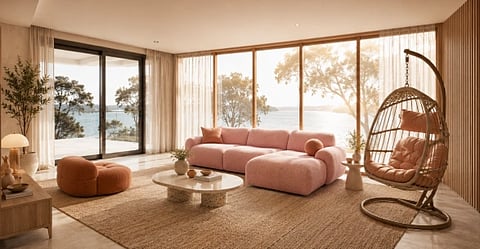Image of a well lit room with cushy couch and an aesthetic room.