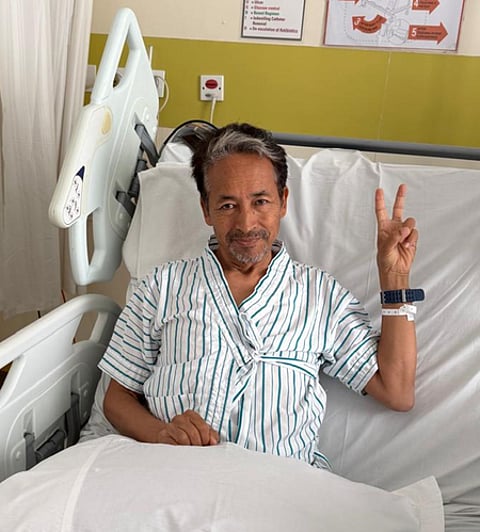 Sonam Wangchuk on Hospital bed after his hunger strike photographed in victory pose.