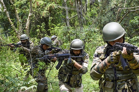 Soldiers with guns