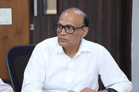 In the image BJP Candidate for Manjalpur Satish Patel is shown