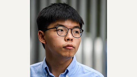 In the image Hong Kong activist Joshua Wong is shown