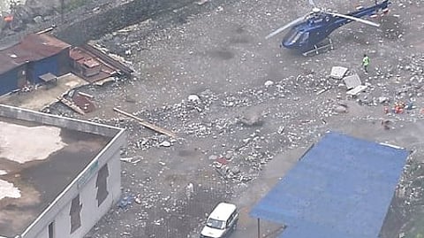 Image of a helicopter standing at the site of Nepal flash flood