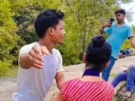 Image of a woman being surrounded by six men who allegedly harassed and assaulted her in Bihar's Mandar Hill.