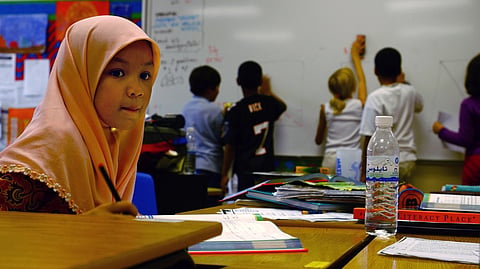 Parents in Baku and elsewhere say school administrations have told girls to remove their head scarves or barred them from classes.