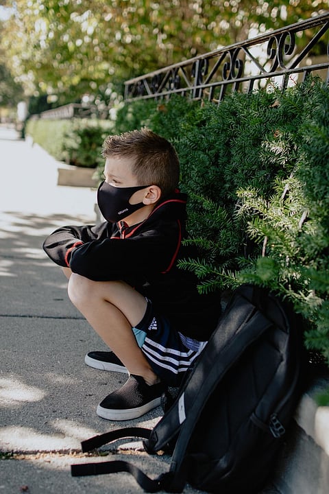 Choose a mask with cheerful designs and decorations that the kids can relate to and will encourage them to wear it. | Photo by Anton on Unsplash