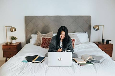Seventy-four per cent of people surveyed said they've experienced pain and discomfort while working from home. | Photo by Mimi Thian on Unsplash