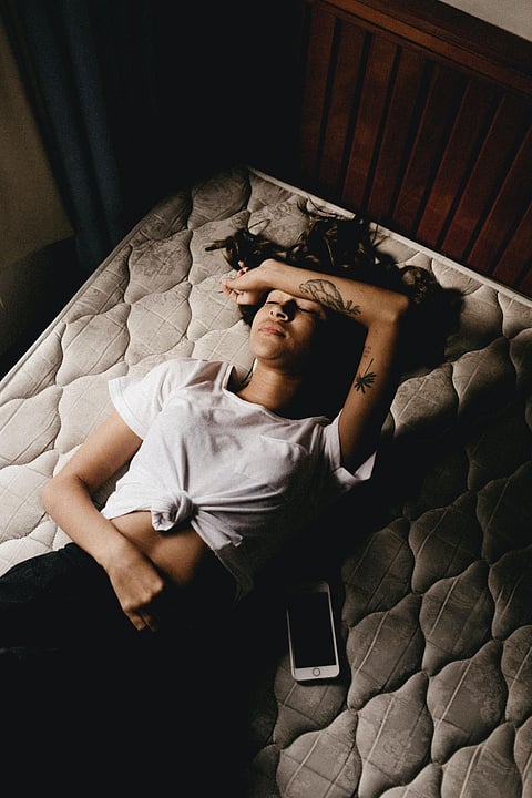Bloating, breast tenderness, irritability and depression which occur premenstrually and disappear with onset of periods are classical symptoms of PMS. | Photo by Elisa Ventur on Unsplash