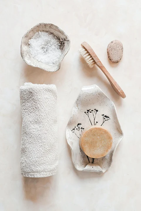 Applying body lotion will help to soothe the top layer of skin and also strengthen the moisture barrier. | Photo by Nati Melnychuk on Unsplash