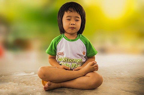 Asanas like Pranayama, Padmasana, Sukhasana, and others, help a child to be aware of themselves and help them control their emotions.