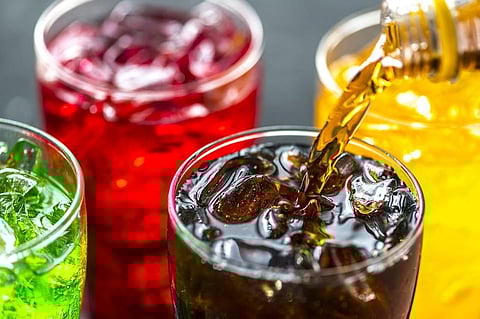 Drinking Soft Drinks Linked to Obesity, Tooth Wear: Research