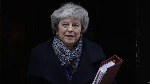 Britain’s Prime Minister Theresa May Survives Through Vote Of No-Confidence