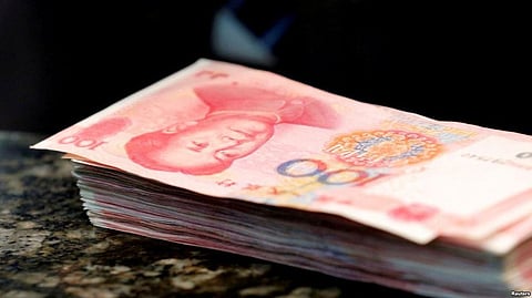 Chinese Yuan Edges Lower Against US Dollar