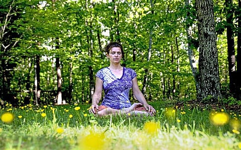 Here’s how the Science links Yoga to Happiness!