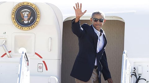 Vacation ends, Obamas arrive back to their Washington home