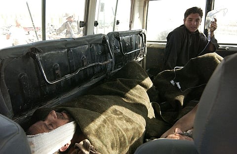 Suspected Taliban Suicide Bomber Hits Court Complex in Pakistan, killing at least 12 people and wounding about 50