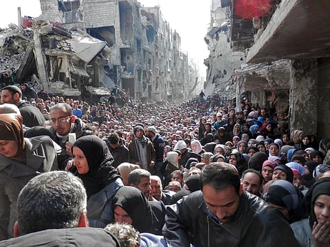First batch of 5,000 Syrians evacuating war-torn town of Daraya, under a new deal