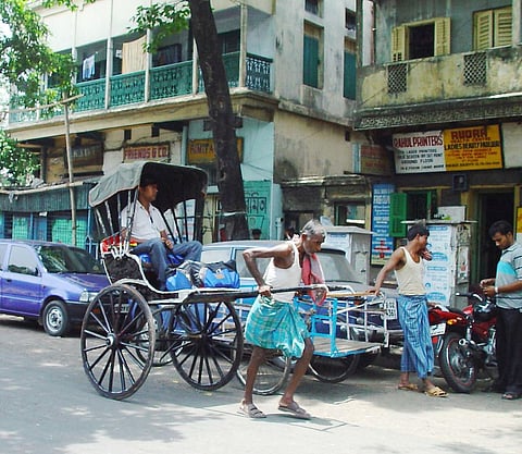 Rickshaw Pullers Felicitated At Photo Exhibition In Kolkata