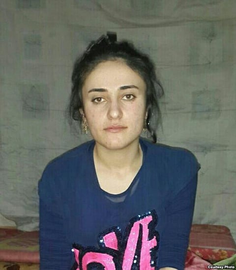 Yazidi Woman, having escaped from ISIS, Awaits Aid