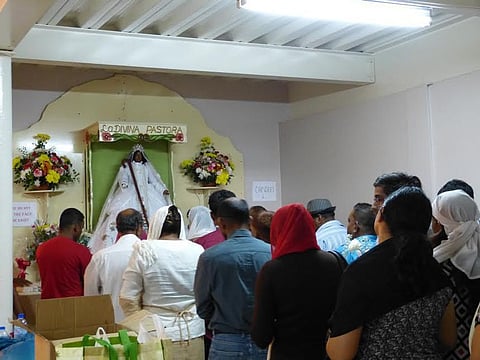 Catholics and Hindus share church in Trinidad and Tobago on Good Friday