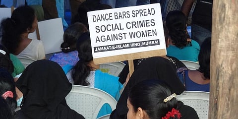 Bar dancers staring at extinction