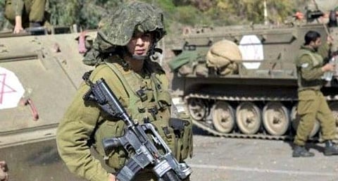 Assault on journalists gets Israeli army officer suspended